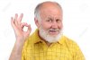10793777-senior-funny-bald-man-in-yellow-t-shirt-is-shows-gestures-and-grimaces.jpg
